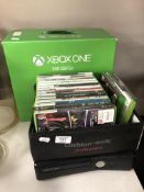 An XBox One box (empty) together with an XBox 360,