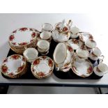 Two trays containing 57 pieces of Royal Albert Old Country Roses tea and dinner china