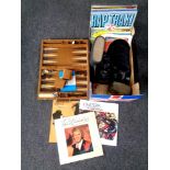 A box containing a quantity of LPs and vinyl 7 inch singles, cased Panorama binoculars,