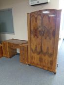 A 1930s walnut double door gentleman's wardrobe together with dressing table (no mirror)