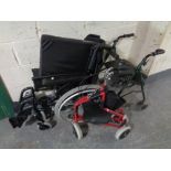 A folding wheelchair together with two mobility walking aids