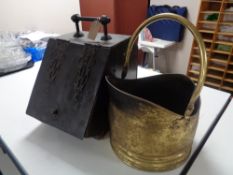 An antique brass coal bucket together with a further coal receiver