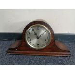 An oak cased 1930s Enfield mantel clock with silvered dial