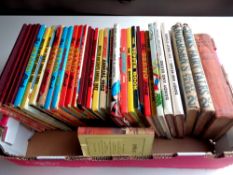 A box containing a quantity of early 20th century and later children's books and annuals to include