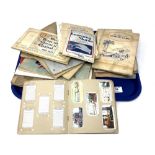 A tray of a large quantity of cigarette cards in albums, aircraft, railways,