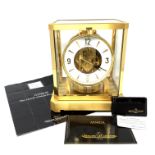A Jaeger-LeCoultre brass cased Atmos clock, case with five glass panels,