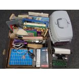 Two boxes containing vintage typewriter, books, door stops, fax rolls, electrical kit,