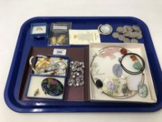 A tray of silver and costume jewellery, coins,