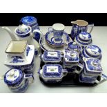 A tray containing a quantity of Ringtons china to include willow pattern teapots, caddies and jugs,