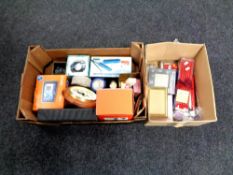 Two boxes containing miscellaneous to include first aid kit, VR headset, clock, Sat Nav,