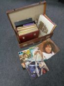 A vintage leather luggage case containing case of LPs to include compilations, musicals,