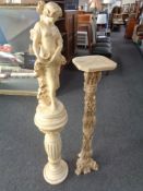 An eastern resin plant stand together with a pottery figure, maiden,