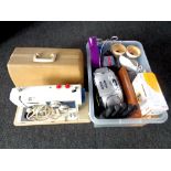 A cased New Home electric sewing machine together with a box containing CD radio,