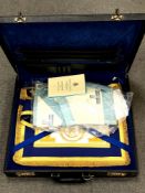 A leather briefcase containing Masonic regalia