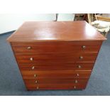 A 20th century stained plywood six drawer plan chest