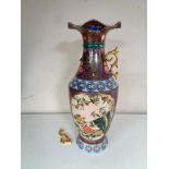 An oriental style floral patterned vase depicting birds (as found)