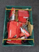 A crate containing a quantity of Hilti wall bolts