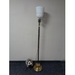 A Tiffany style table lamp with leaded glass shade together with an early 20th century brass