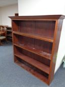 A set of early 20th century mahogany and pine open bookshelves