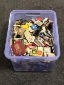 A box containing a very large quantity of match books