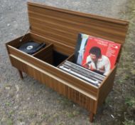 A 1960's record player / radio cabinet, circa 1965.