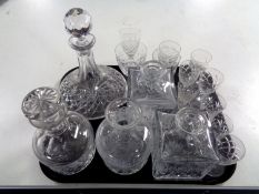 A tray containing ship's decanter with stopper together with four other decanters and a quantity of