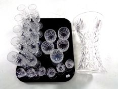 A tray containing a quantity of 20th century cut glass including tall flower vase,