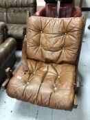 A twentieth century continental beech framed chair with tan leather upholstered cushion (Af)