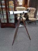 A Prinz Model 330 astronomical telescope on tripod stand