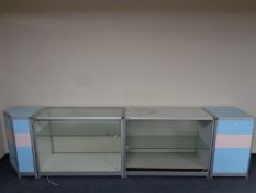 A pair of glazed shop counters together with two further cabinets