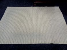 A contemporary cream rug