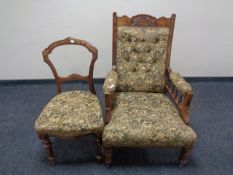 An Edwardian carved beech gentleman's armchair upholstered in tapestry fabric,