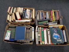 Four boxes containing a large quantity of assorted books including French culture, history,