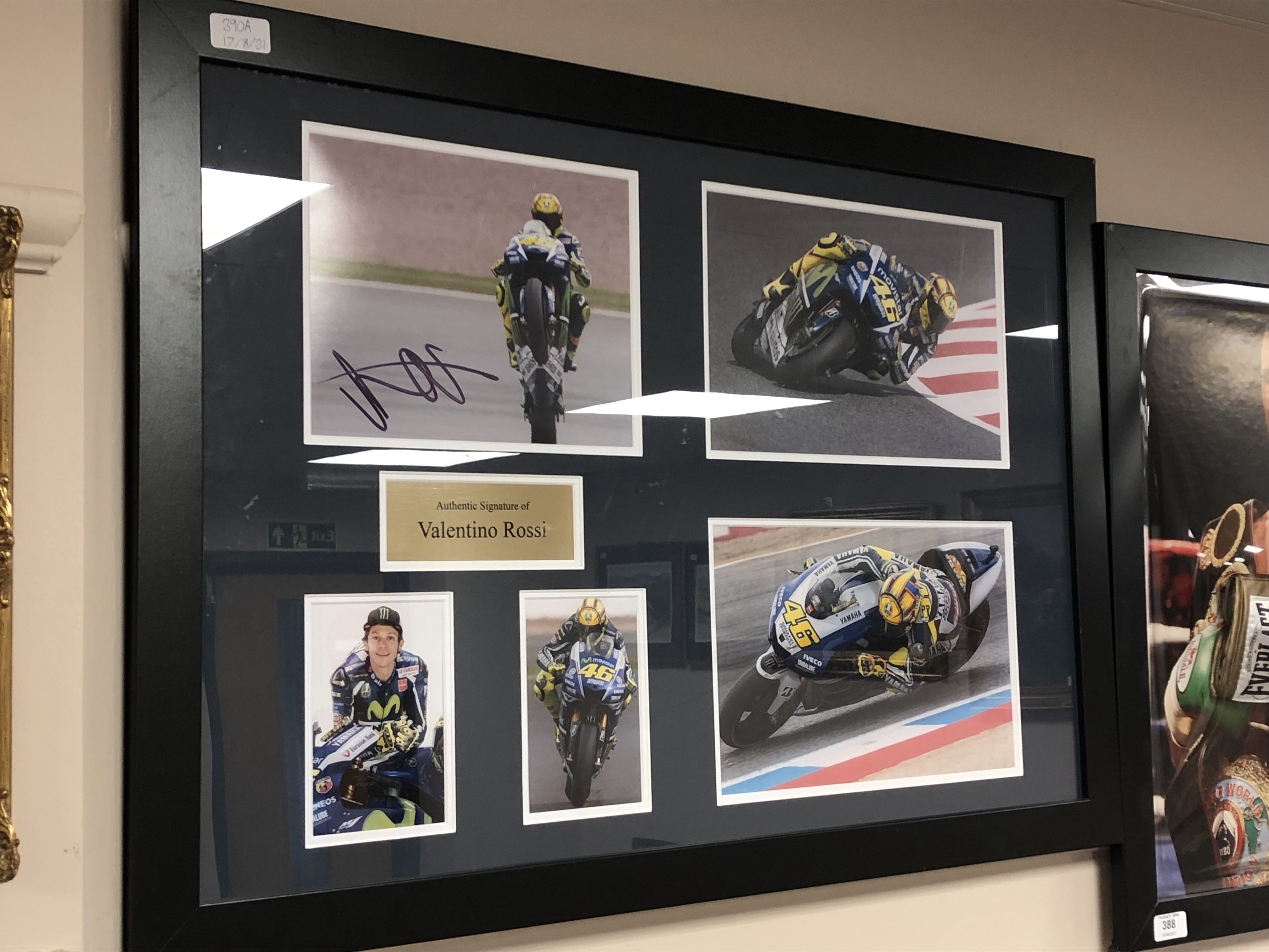 A sporting memorabilia montage : Valentino Rossi, signed photographic print,