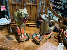 A pair of 19th / early 20th century hand painted children toys in the form of mythical figures on