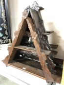 Three Continental carved wooden triangular wall shelves