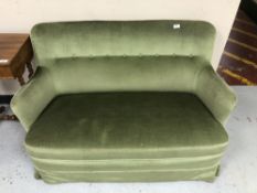 A twentieth century Continental two seater settee in green buttoned upholstery