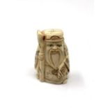 A carved Chinese bone netsuke -Elderly Gentleman with staff