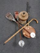 A box containing two shooting sticks, walking cane, copper samovar,