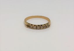 An 18ct gold six stone diamond ring (one stone missing), size N CONDITION REPORT: 1.
