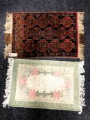 A small Afghan rug together with one other rug (2)