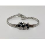 An 18ct white gold sapphire and diamond bracelet, approximately 1ct of diamonds, length 17.5cm.