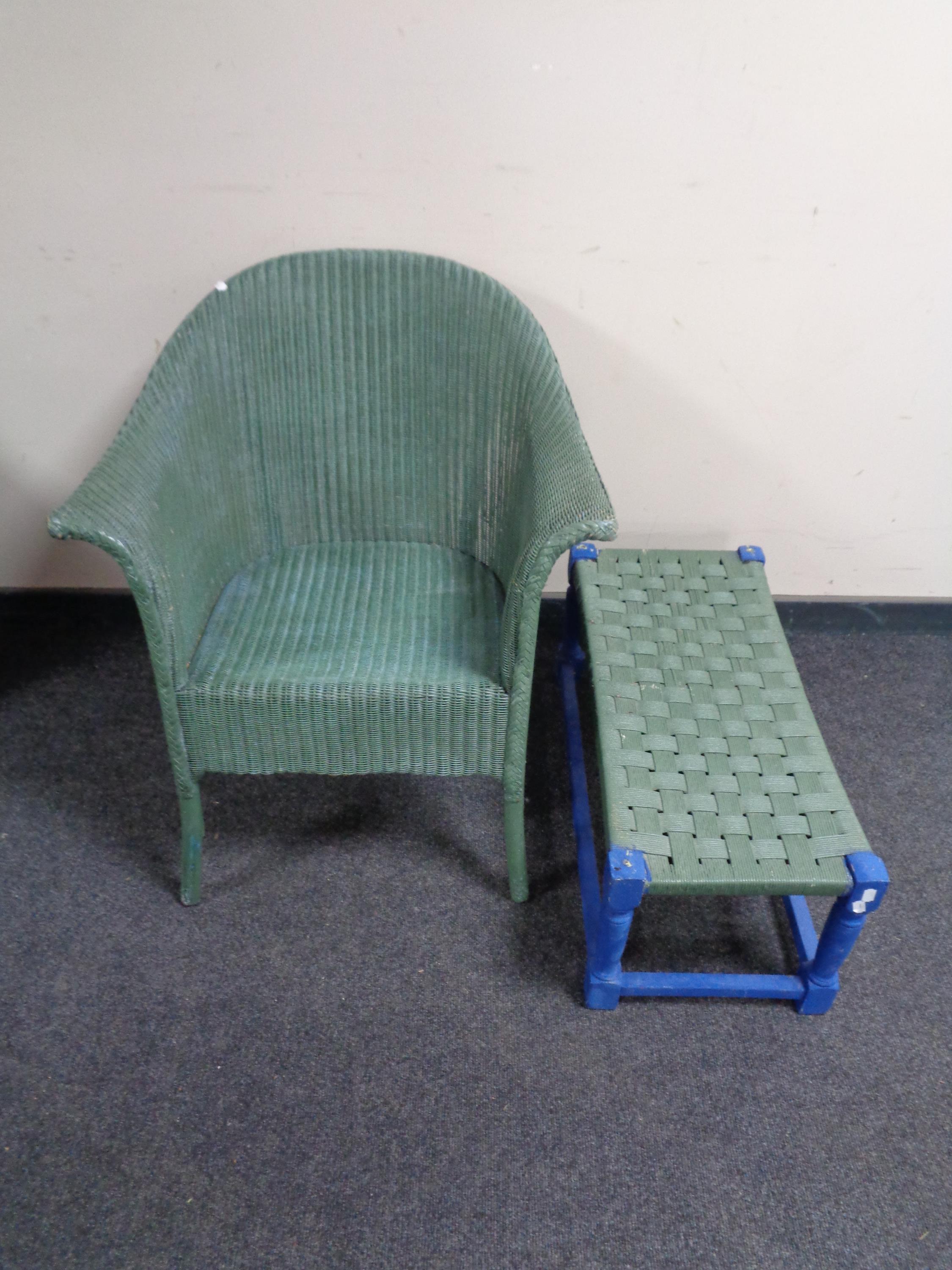 A green loom armchair together with similar painted rectangular stool