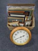 A contemporary quartz wall clock together with a box of assorted pictures and prints,
