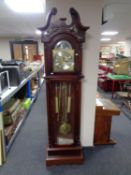 A contemporary Windsor 31 day longcase clock with brass and silver dial