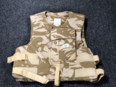 A desert pattern body armour vest