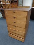 A 20th century teak seven drawer chest