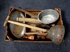 A box of antique copper cast iron handled pans, rolling pin,