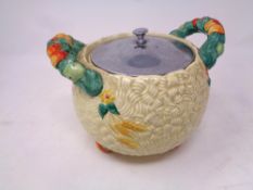 A Newport Pottery Clarice Cliff twin handled biscuit barrel