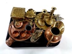 A tray containing copper and brass ware including candlesticks, copper and brass jug,